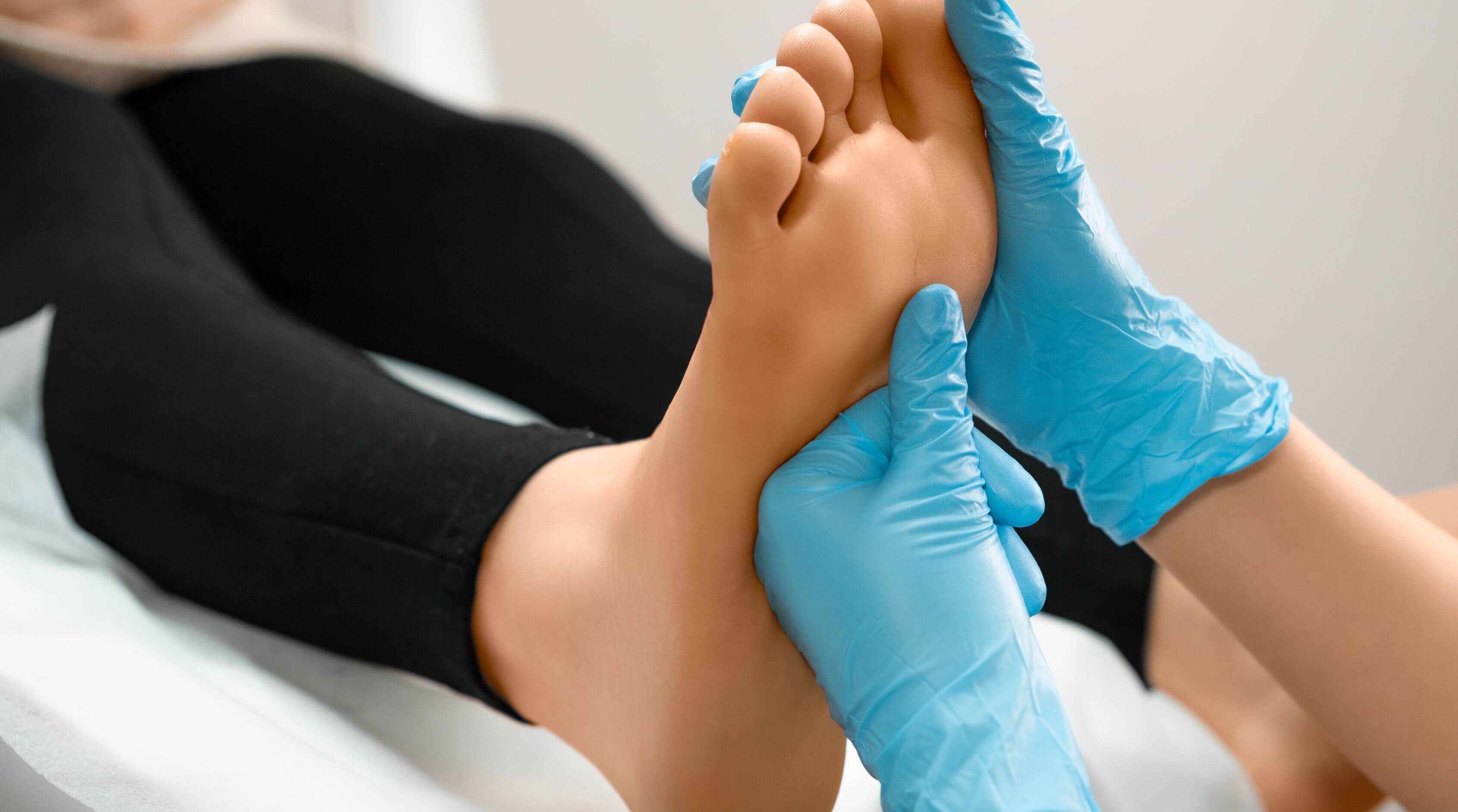 podiatrist working on foot